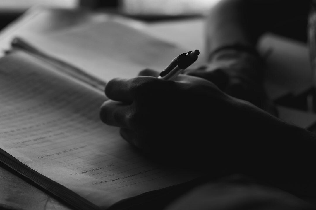 person writing notes